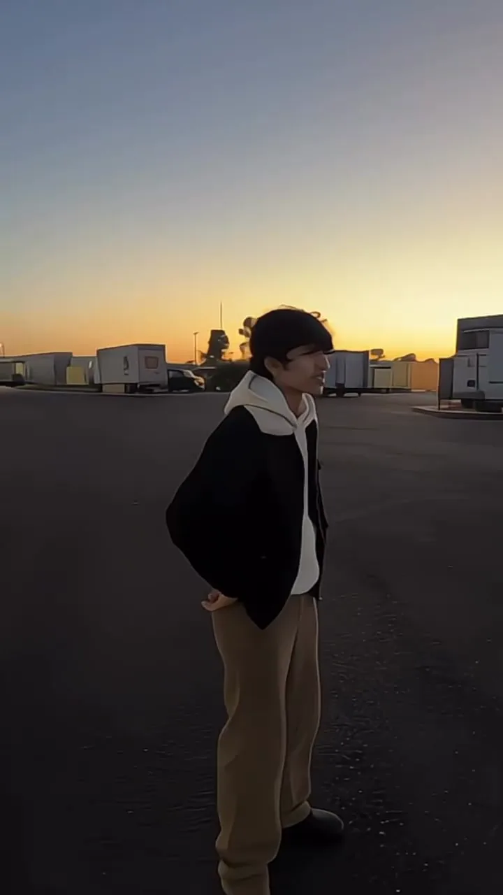 Standing on the tarmac at sunset